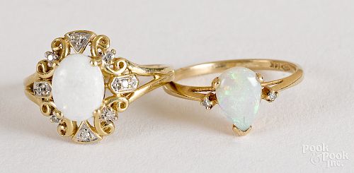 Two 14K gold, opal and diamond rings