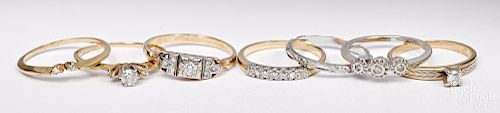 Seven 14K gold and diamond wedding rings