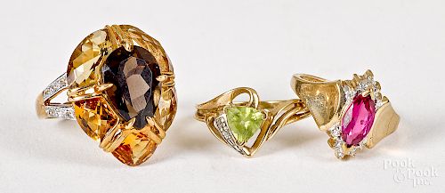 Seven 10K gold and gemstone rings