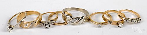 Eight 14K gold and diamond rings