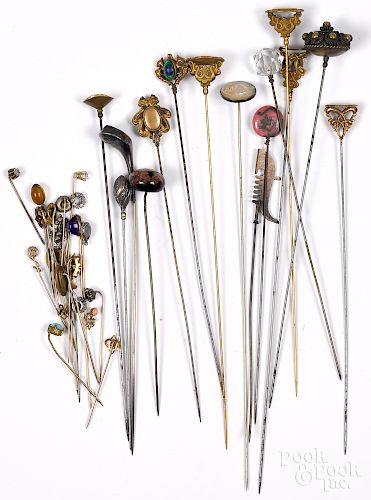 Collection of fifteen Victorian hat pins, etc.
