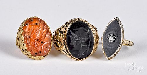 Three 14K gold and stone mounted rings
