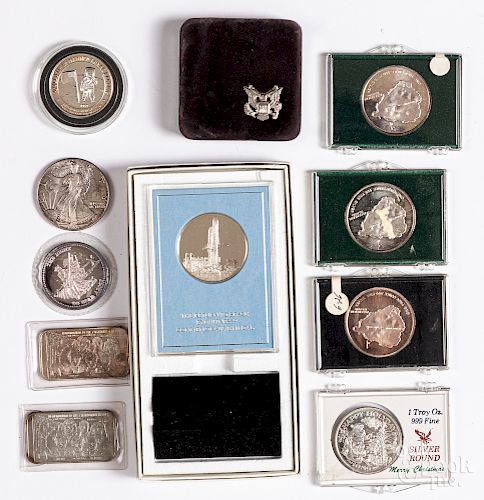Seven 1 ozt. fine silver coins, etc.