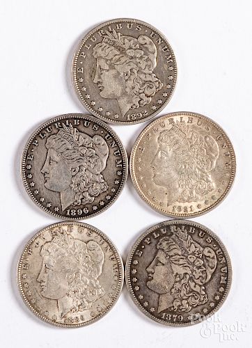 Five Morgan silver dollars