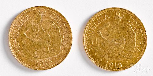 Two Columbia five peso gold coins