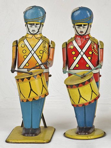 Two Wolverine tin wind-up Drum Major toys, 13 1
