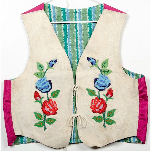 A Pair of Complementing Plateau Beaded Hide Vests