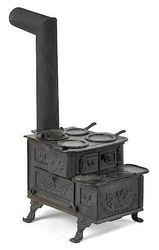 M. Greenwood cast iron Stella toy stove, dated