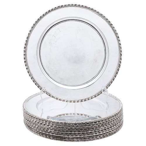 LOT OF BASE PLATES. MEXICO, 20TH CENTURY. Sterling 0.925 Silver. Marked TANE. Circular design with pressed edges. Weight: 7,860 g. Pieces: 12.