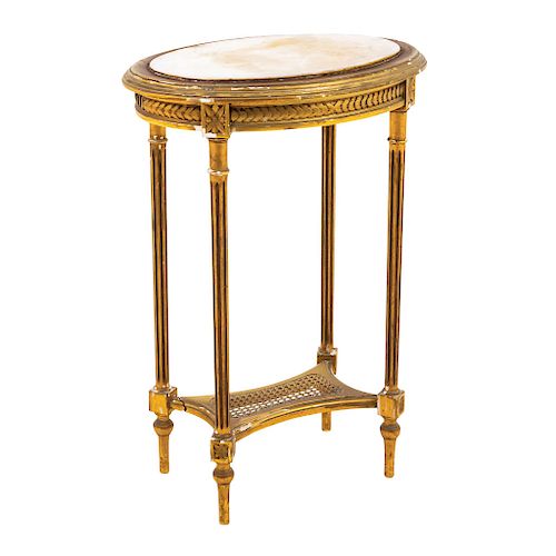 SIDE TABLE. FRANCE, CIRCA 1900. LOUIS XVI Style. Gilded wood with oval marble cover. 29 x 20 x 15 in