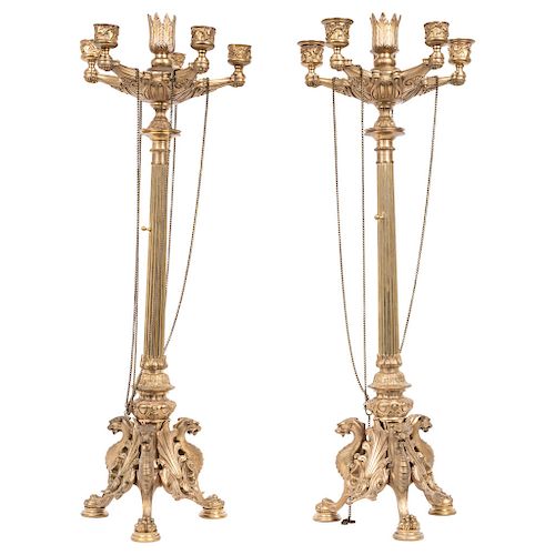 A PAIR OF CANDELABRA. 20TH CENTURY. Gilded bronze. With five arms and base for six lights (candles). Decorated with plant motifs. 26 in high each one.