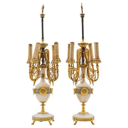 A PAIR OF TABLE LAMPS. Alabaster, gilded bronze and champlevé enamel. For four electric lights. Signed on the base "F. BARBEDIENNE".