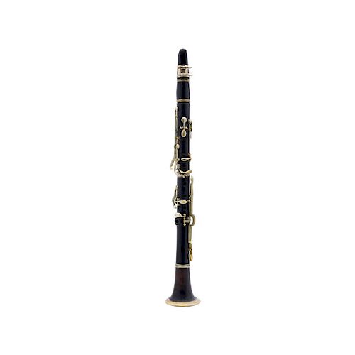 CLARINET. FIRST HALF OF THE 20TH CENTURY. Ebonized wood and nickel-plated keys. With nozzle and case.