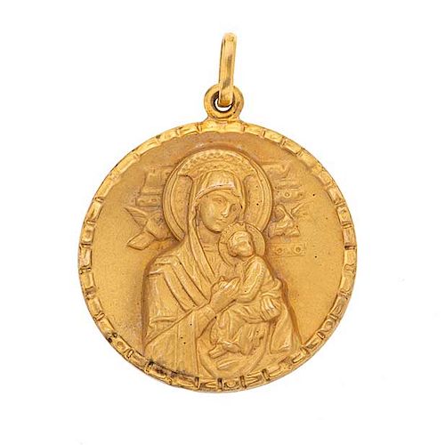 Medalla de chapa. Imagen de Virgen en relieve. Peso: 6.7 g.