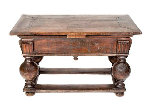 A Flemish Carved Oak Draw Leaf or Bolpoottafel Table
Height 31 x width 51 1/4 x depth 28, two leaves 21 3/4 inches.