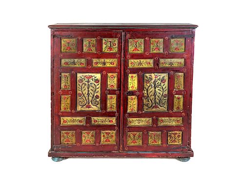 A Northern European Painted Cupboard
Height 52 1/4 x width 50 x depth 13 1/2 inches.