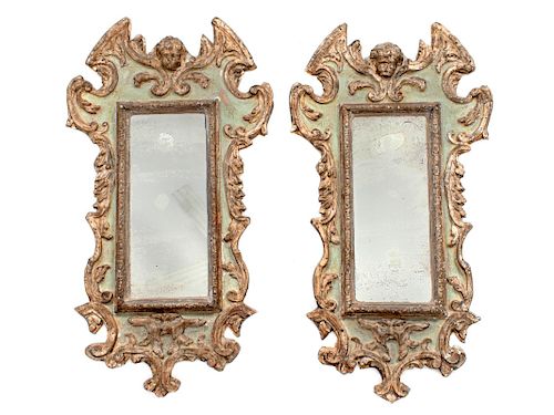 A Pair of Italian Painted and Gilt Gesso Mirrors 
Height 32 1/2 x width 18 inches.