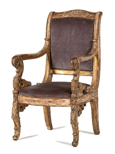 A Regence Style Carved, Painted and Parcel Gilt Fauteuil
Height 38 inches.