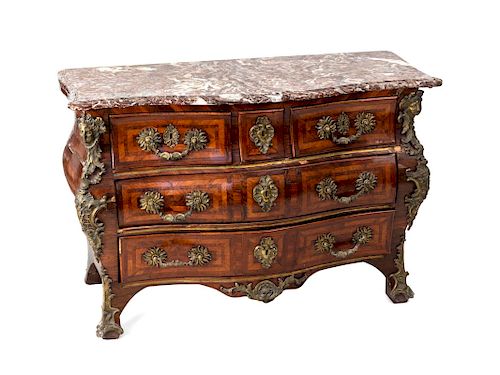 An Important Louis XV Gilt-Bronze Mounted, Rosewood and Marble Top Commode
Height 35 x width 50 x depth 26 inches.