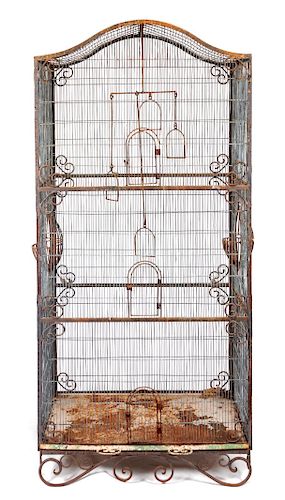 A Cast Iron Birdcage 
Height 78 1/2 x width 40 x depth 24 inches. 
