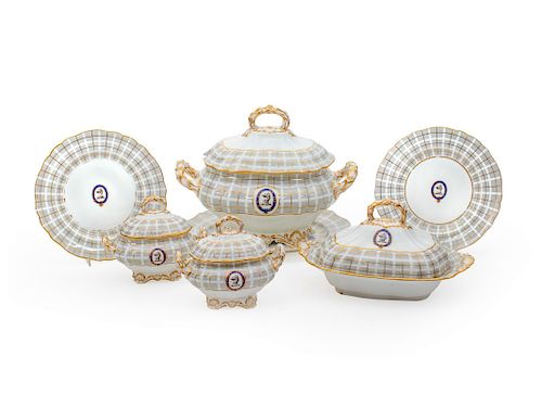 An English Porcelain Armorial Partial Dinner Service
Length of platter 14 1/2 inches.