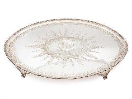 A George III Silver Salver
Length 21 1/4 x depth 15 1/2 inches.