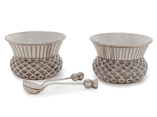 A Pair of English Silver Thistle-Form Salts
Height 1 1/2 x diameter 2 inches.