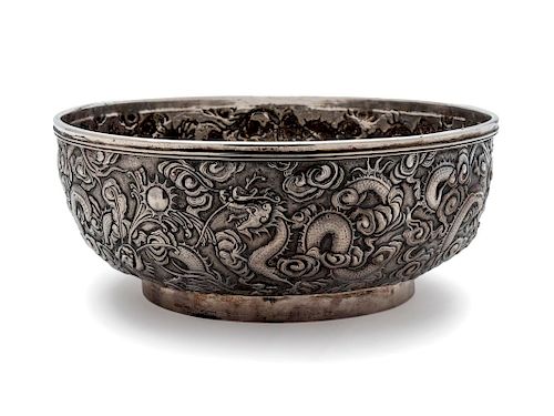 A Chinese Export Silver Dragon Bowl
Height 3 1/4 x diameter 8 1/4 inches.