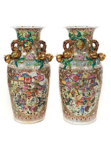 A Pair of Chinese Famille Rose Porcelain Palace Vases
Height 37 x diameter 17 inches.