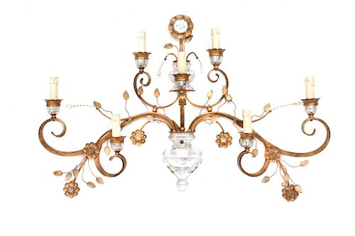 A Maison Bagues Gilt Bronze and Crystal Seven-Light Wall Sconce
Height 26 x width 41 1/2 inches.