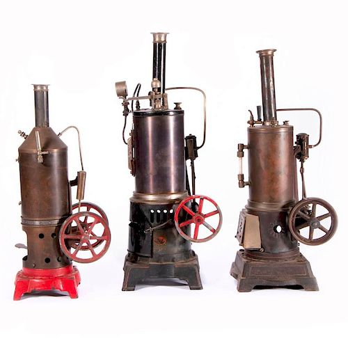 Three toy steam engines.