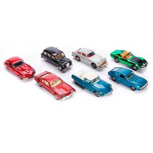 Seven Corgi toy cars.