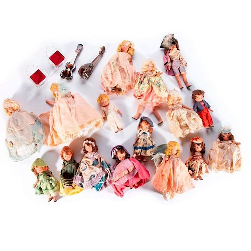 Group of dolls plus two instruments.
