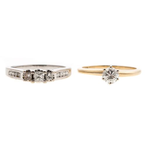 A Pair of Ladies Diamond Engagement Rings in Gold