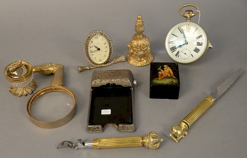 Tray lot with heavy gilt bell, equestrian magnifying glass with horse head handle, table lighter, globe desk alarm clock and silver plated notepads al