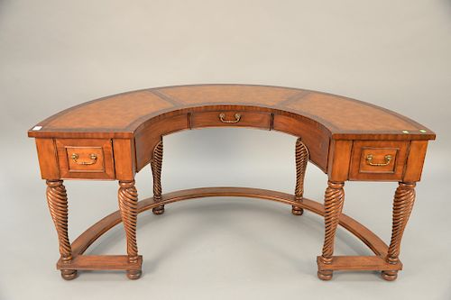 Half round desk with leather top and three drawers. ht. 30 1/2 in., wd. 66 in., dp. 35 in.