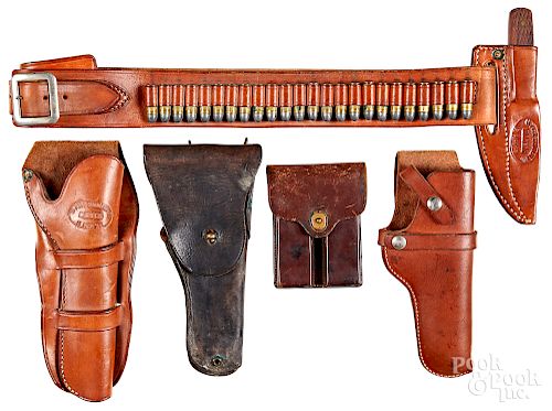 Three leather holsters, etc.