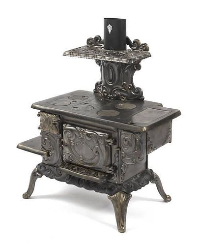 Cast iron Wedgewood toy stove, 12 1/2'' h., 21''