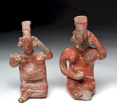 Pair of Jalisco Pottery Seated Female Sheepface Figures