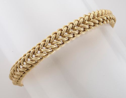 Brev Italian 18K gold bracelet in woven design.