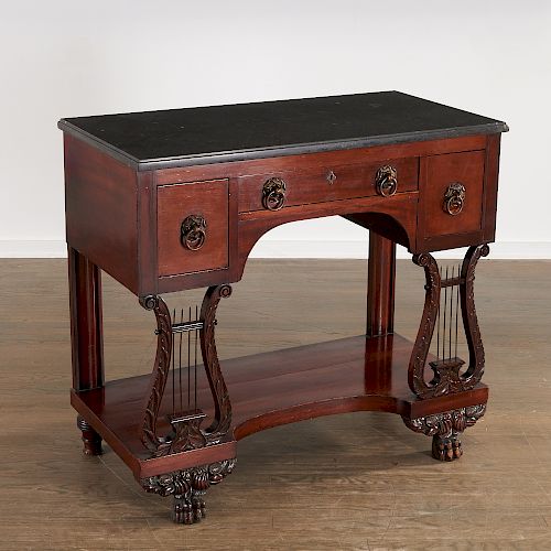 American Classical carved mahogany table