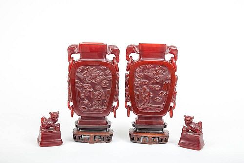 Pair of Asian Carved Composition Urns and Covers