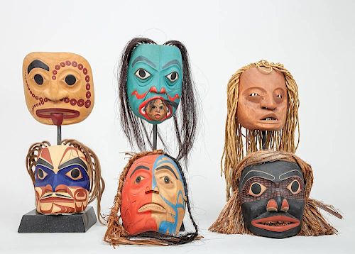 Seven Northwest Coast Carved and Painted Wood Masks