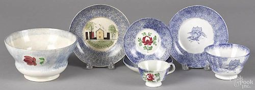 Seven pieces of blue spatter, to include a transfer eagle cup and saucer, a fort saucer