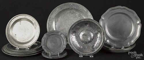 Seventeen assorted pewter plates and shallow bowls, to include several by Townsend & Compton