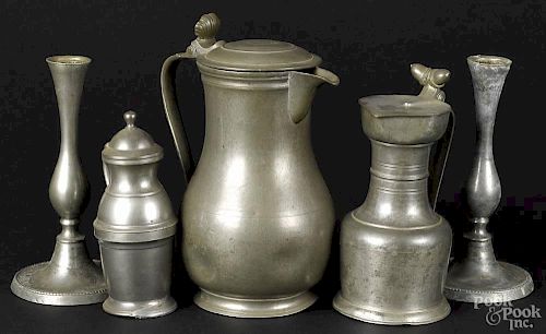 Two Continental pewter flagons, together with a pair of candlesticks and a syrup pitcher