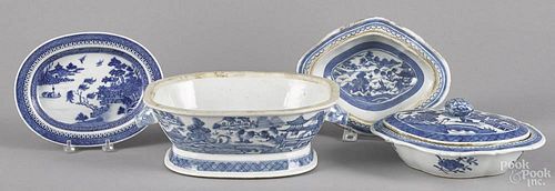 Four pieces of Chinese export blue and white porcelain, 19th c., to include a tureen (lacking cover)