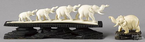 Carved ivory elephant group, ca. 1900, 9'' l., together with a single ivory elephant, 2 3/4'' l.