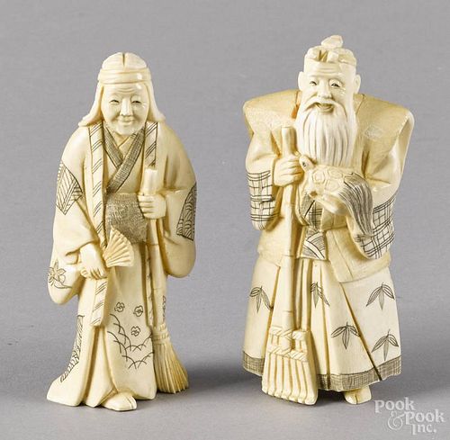 Pair of Japanese Meiji period carved ivory figures of a man and woman, 4'' h.