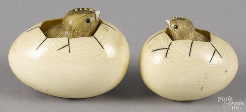 Two Japanese carved hatching chick netsuke.